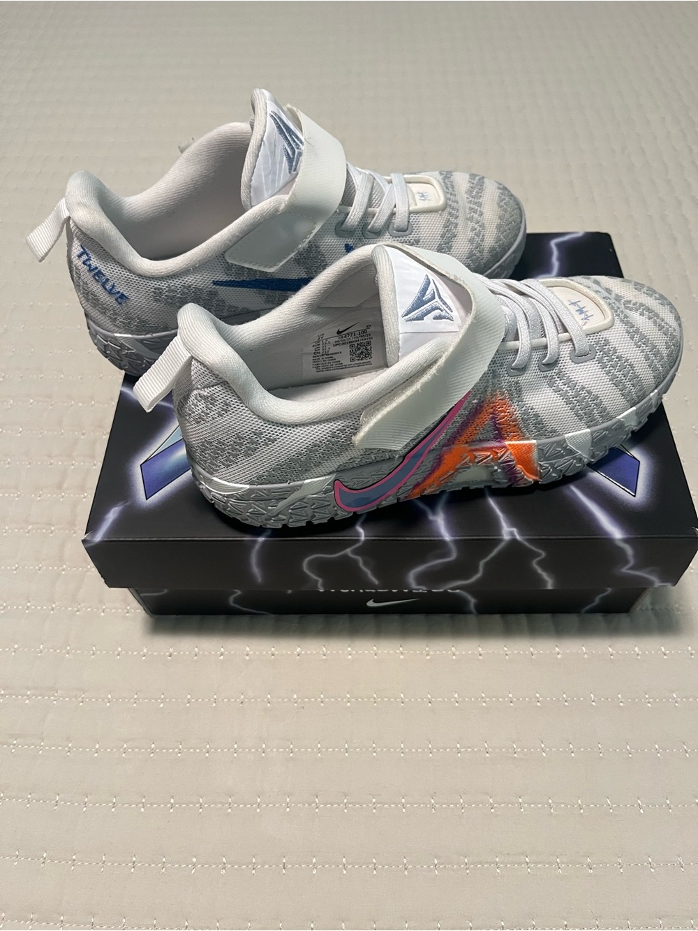 Nike Kids White Sneakers with Blue and Pink Accents (Ja 3 PS)
